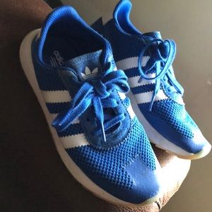Blue w/ white adidas sneakers in women